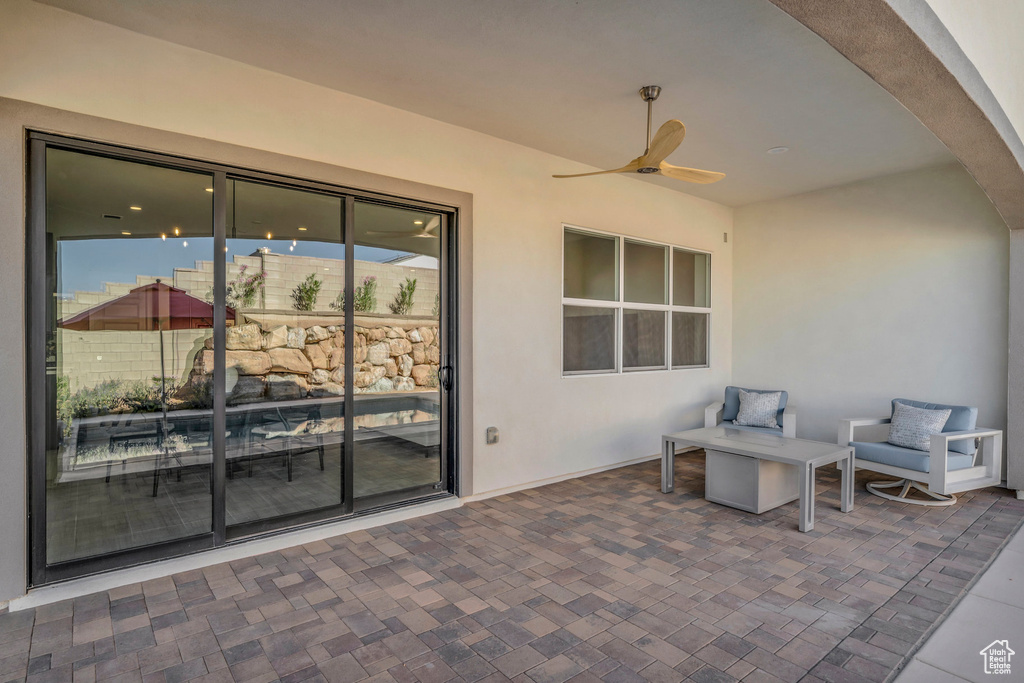 View of patio / terrace with ceiling fan