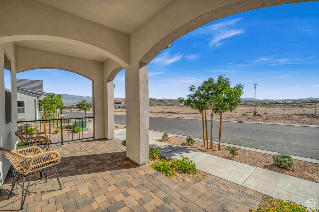 View of patio featuring a mountain view