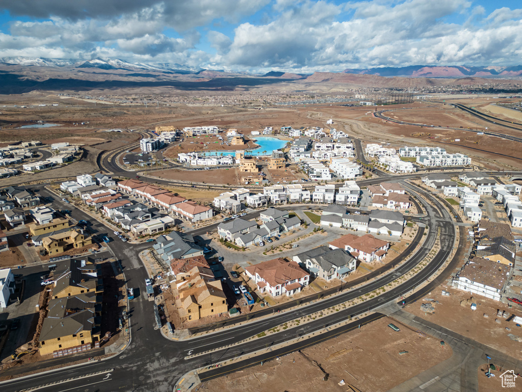 Birds eye view of property featuring a mountain view