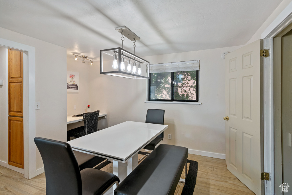 Dining area featuring light hardwood / wood-style flooring