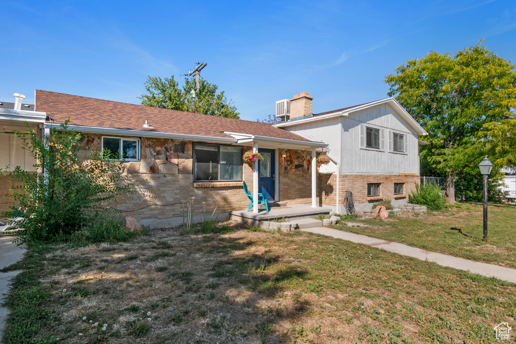 View of front of home with a front yard