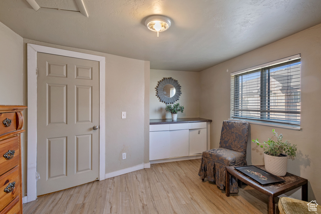 Living area featuring light hardwood / wood-style flooring