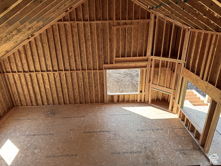 Misc room featuring lofted ceiling