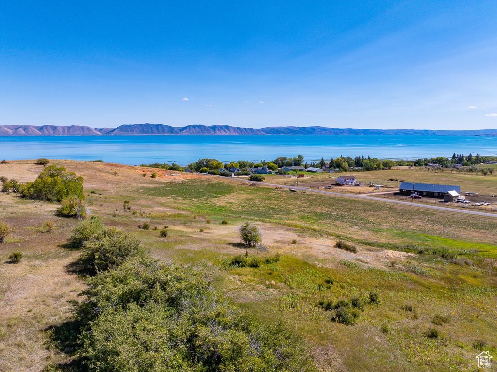 Property view of water with a mountain view