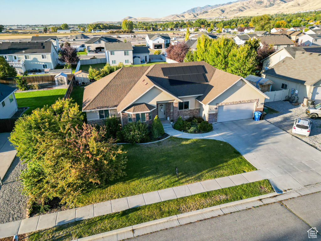 Birds eye view of property with a mountain view