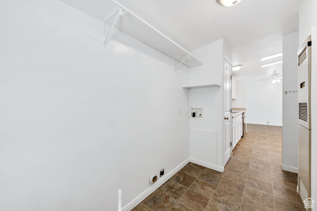 Laundry area with hookup for a washing machine, hookup for an electric dryer, and ceiling fan