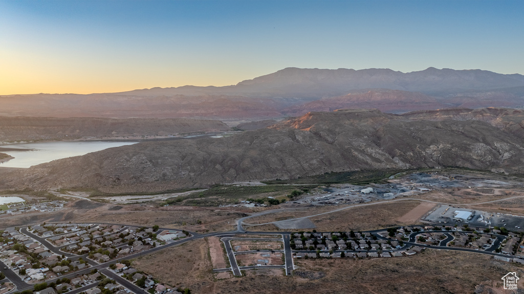 Property view of mountains with a water view