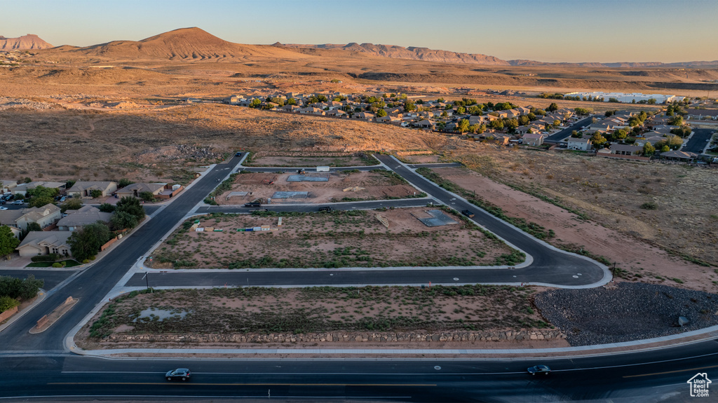 Aerial view at dusk featuring a mountain view