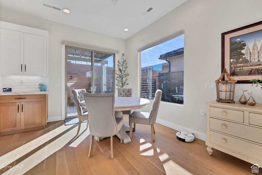 Dining area featuring light wood-type flooring