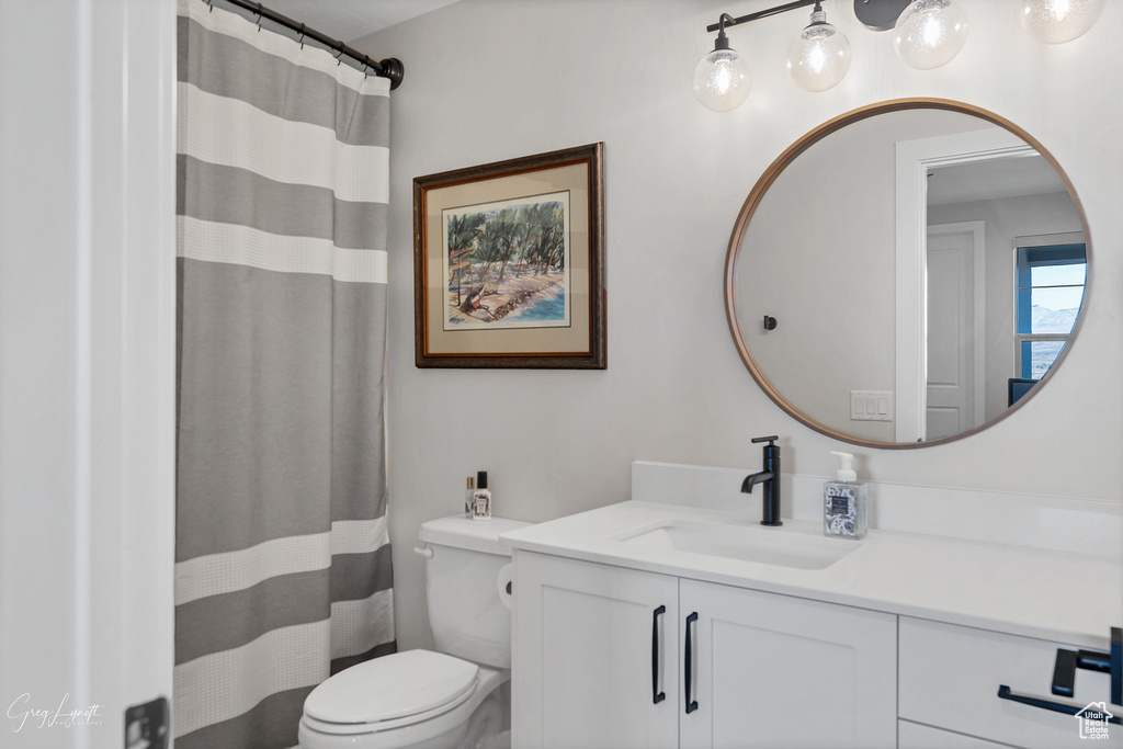 Bathroom with vanity and toilet