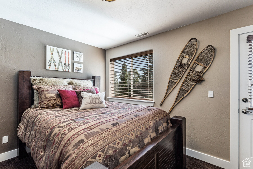 Bedroom with carpet