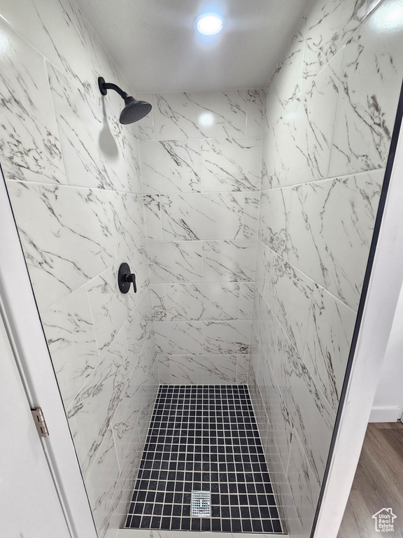 Bathroom with a tile shower