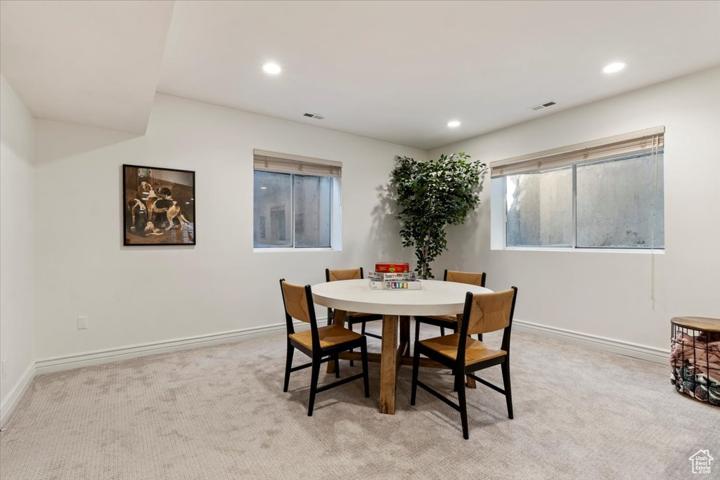 View of carpeted dining space