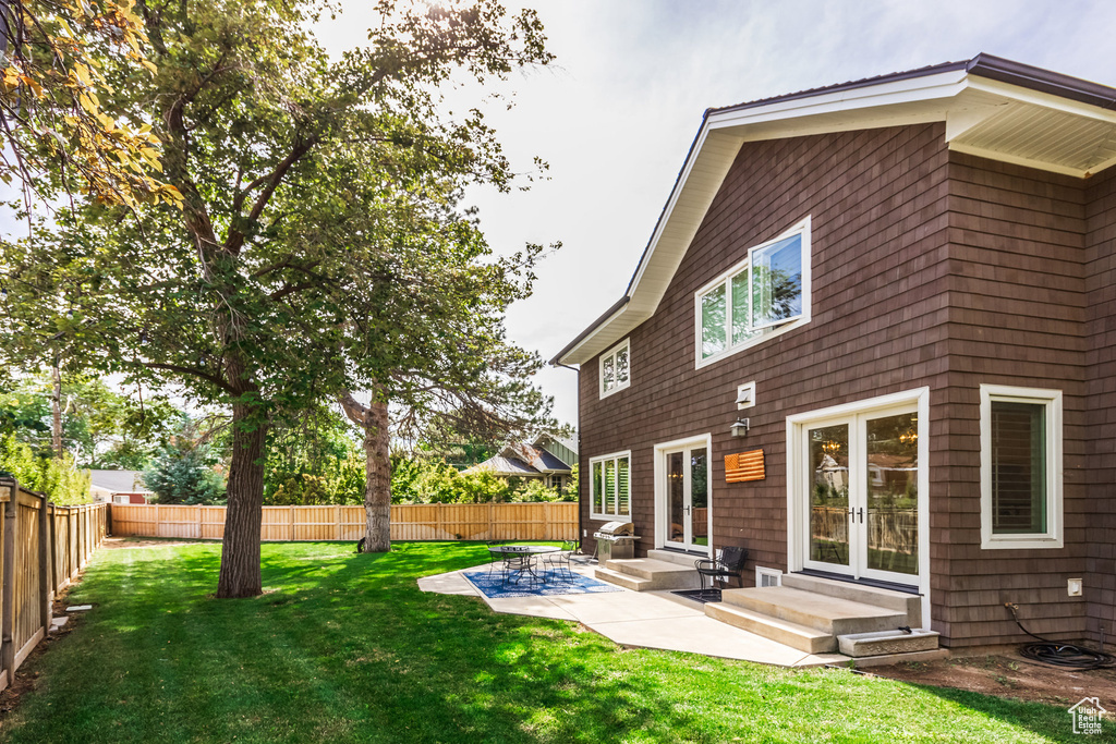 View of yard with a patio area