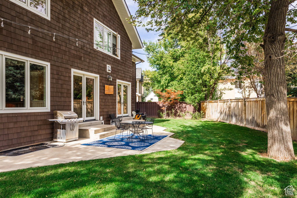 View of yard with a patio