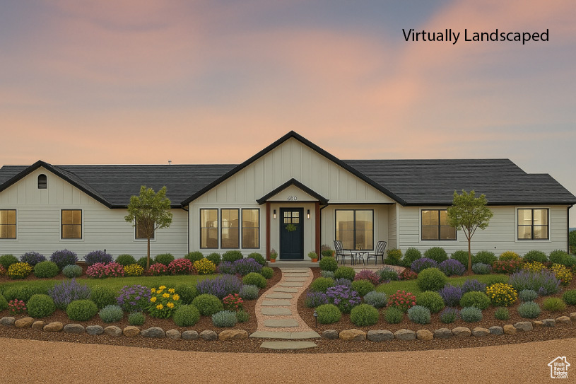 Modern farmhouse style home with board and batten siding and roof with shingles