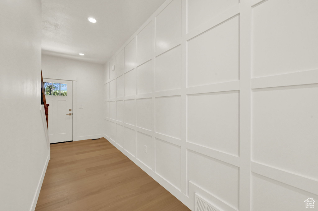 Corridor featuring light hardwood / wood-style flooring