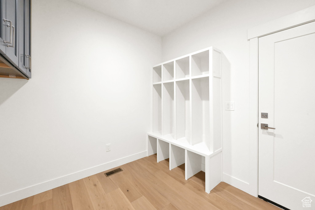 Mudroom featuring hardwood / wood-style floors