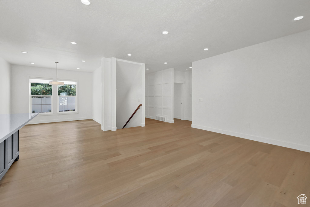 Empty room with light wood-type flooring