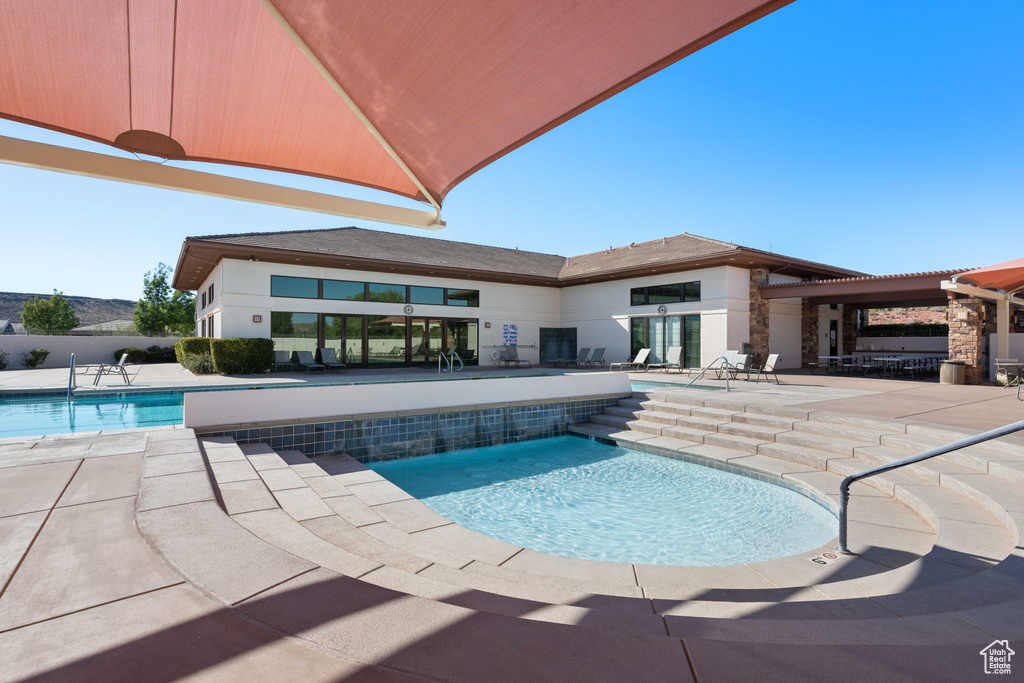 View of pool with a patio area