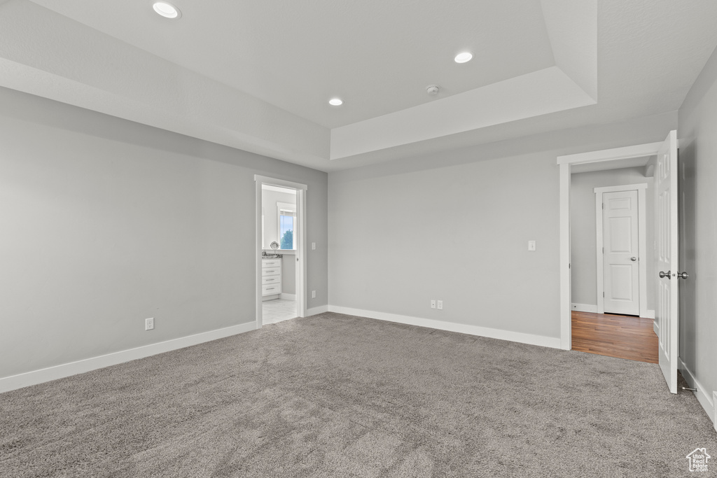 Unfurnished room with carpet floors, recessed lighting, and baseboards