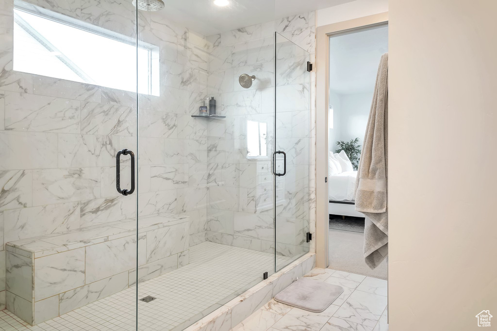 Bathroom featuring a shower with shower door