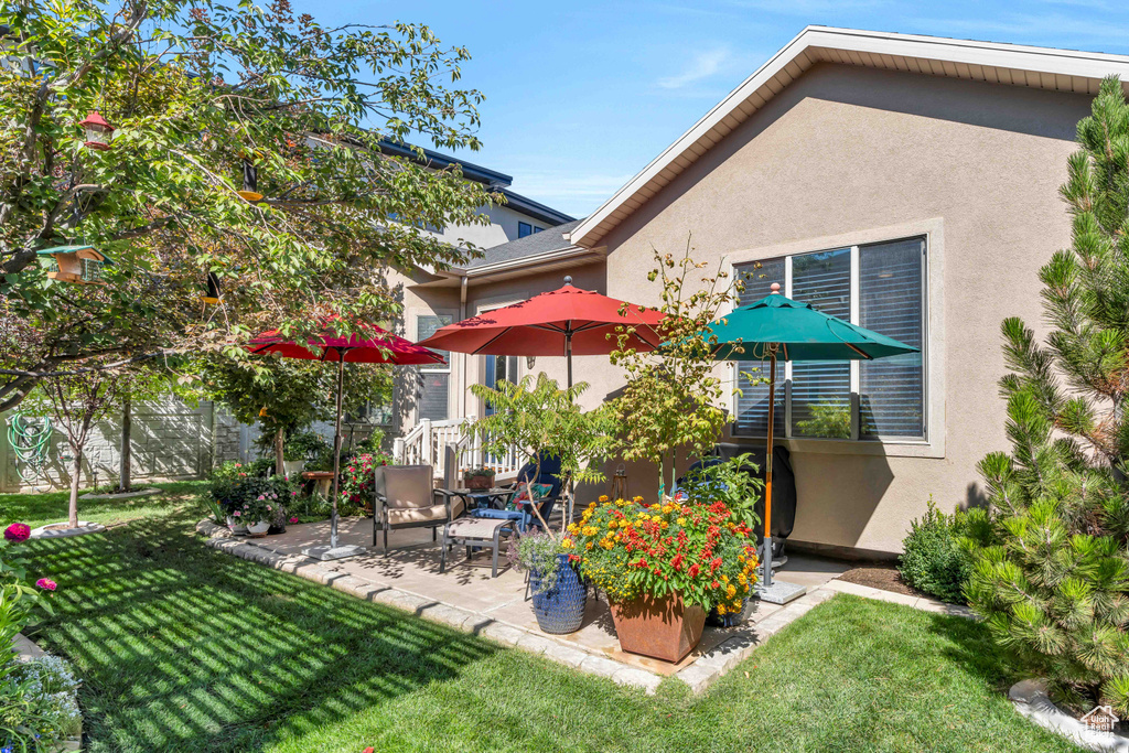 View of yard with a patio area