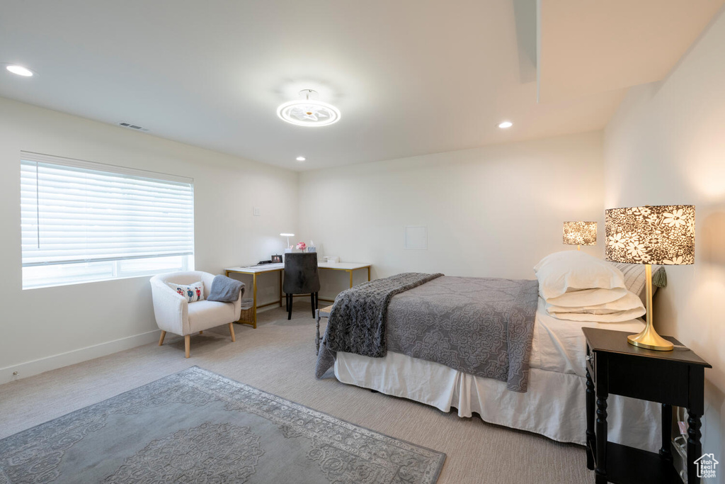 Bedroom with carpet flooring