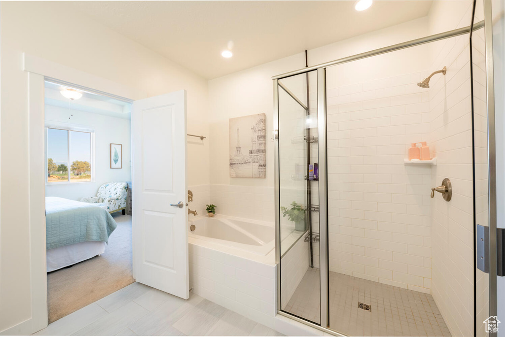 Bathroom with shower with separate bathtub