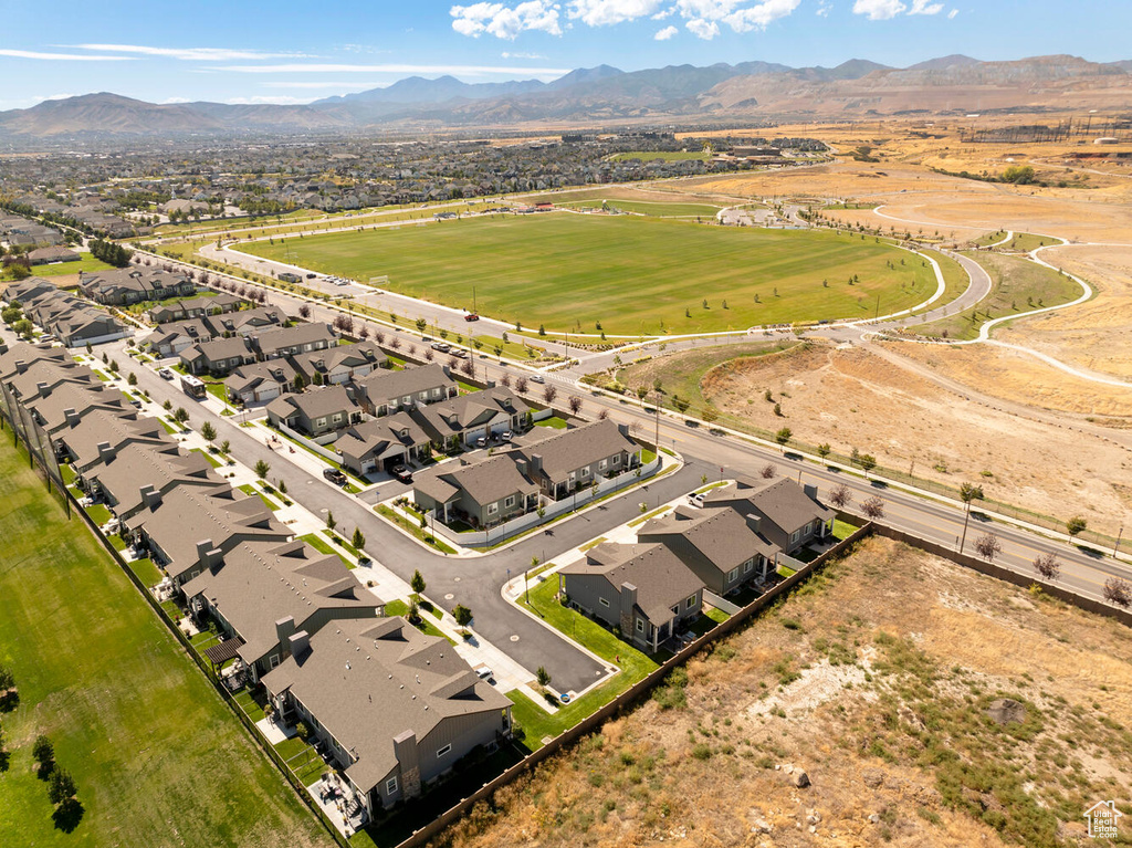 Birds eye view of property with a mountain view