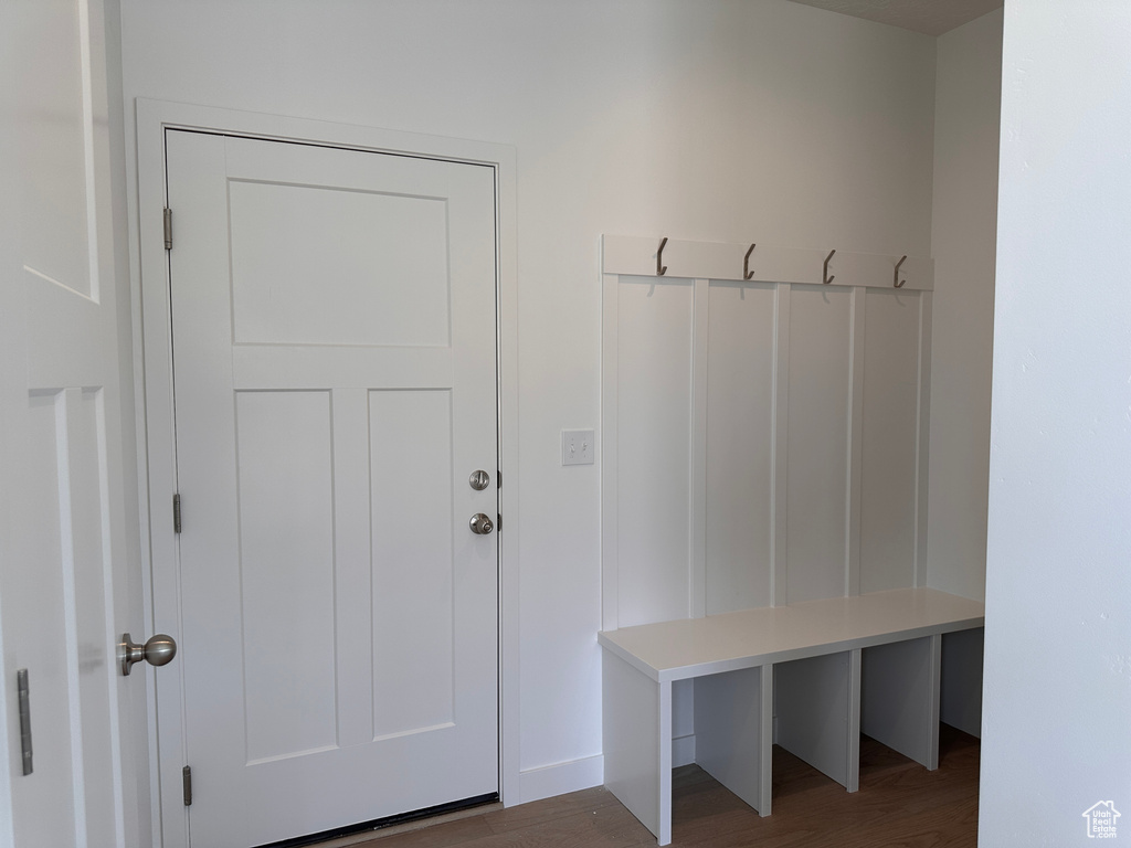 Mudroom with dark wood-type flooring