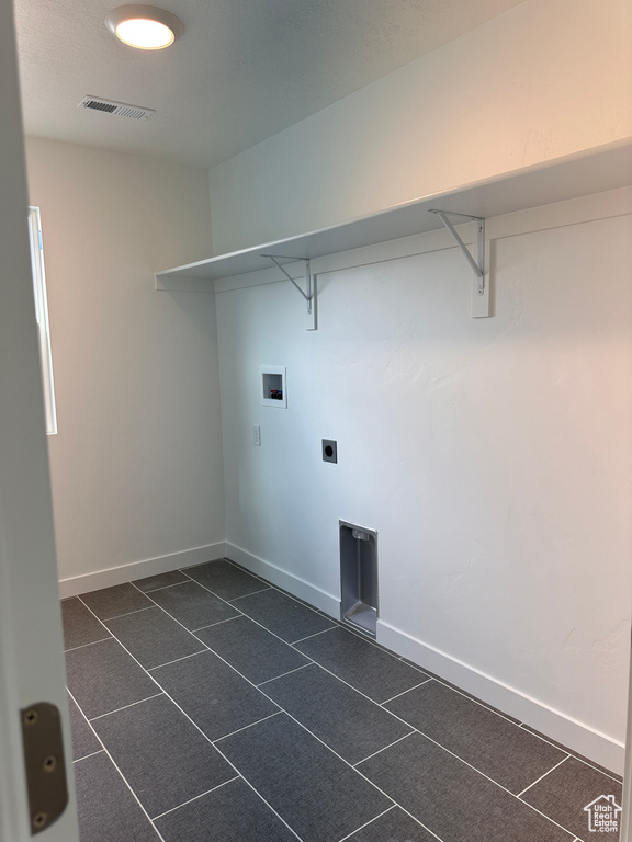 Washroom with washer hookup and hookup for an electric dryer