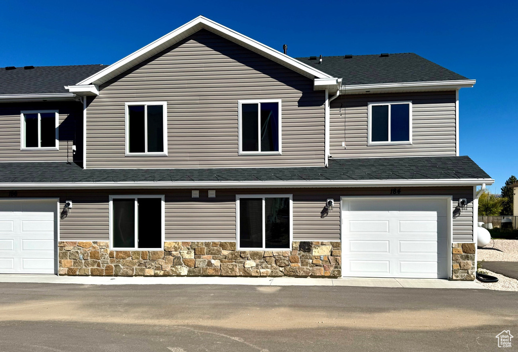 View of front of home with a garage