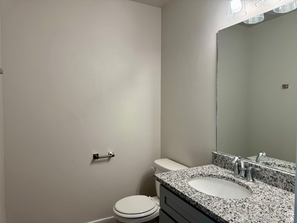 Bathroom with vanity and toilet