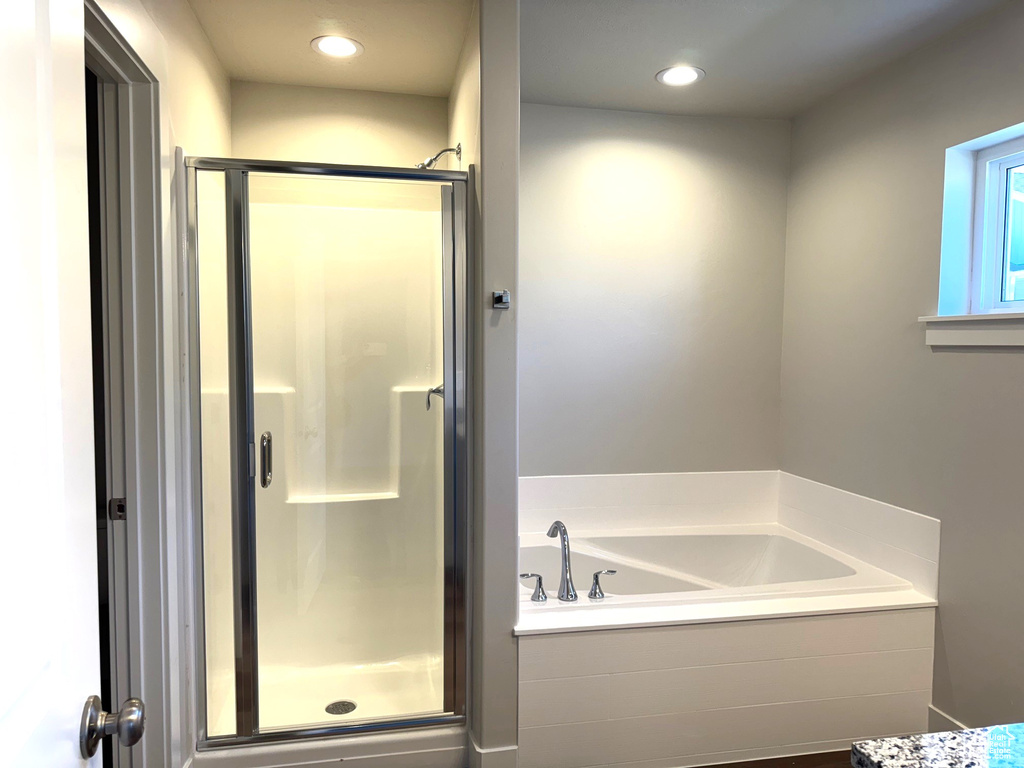 Bathroom with independent shower and bath