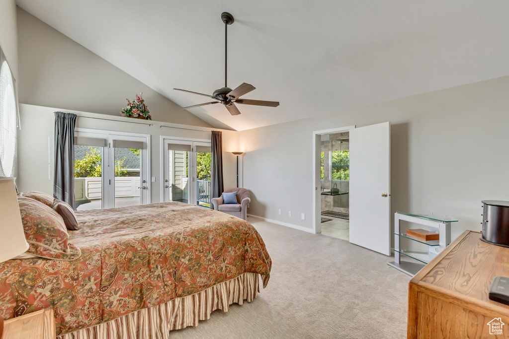 Carpeted bedroom with ceiling fan, access to outside, french doors, and multiple windows