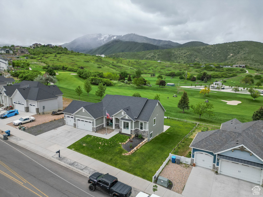View of subject property featuring a mountain backdrop