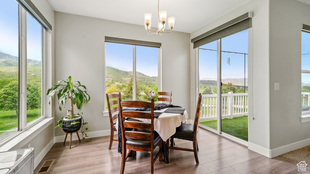 Dining space with a mountain view and healthy amount of natural light