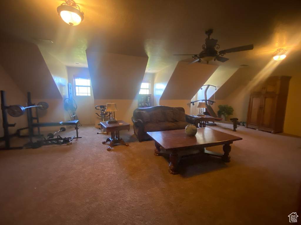 Bonus room featuring carpet flooring and ceiling fan