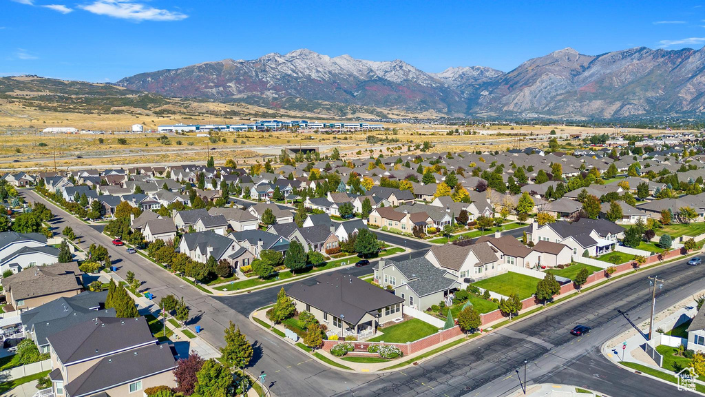 Birds eye view of property with a mountain view