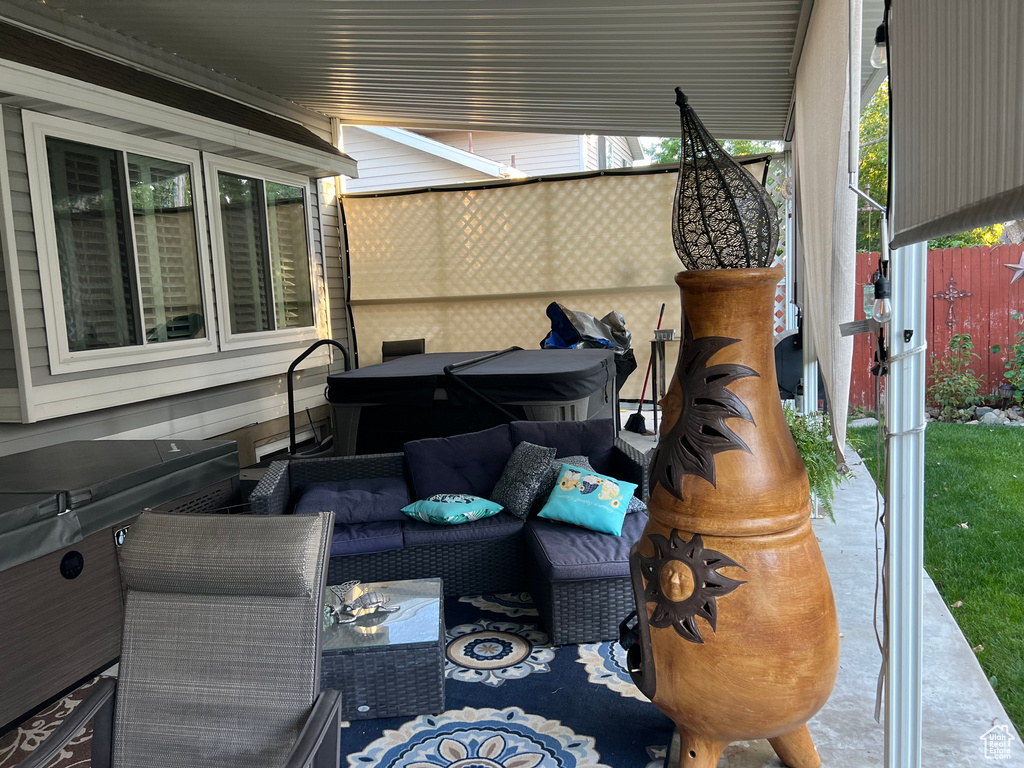 View of patio featuring an outdoor hangout area