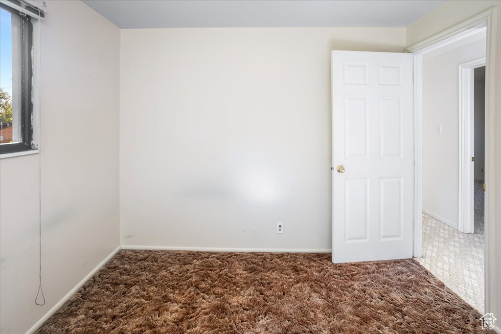 View of carpeted spare room