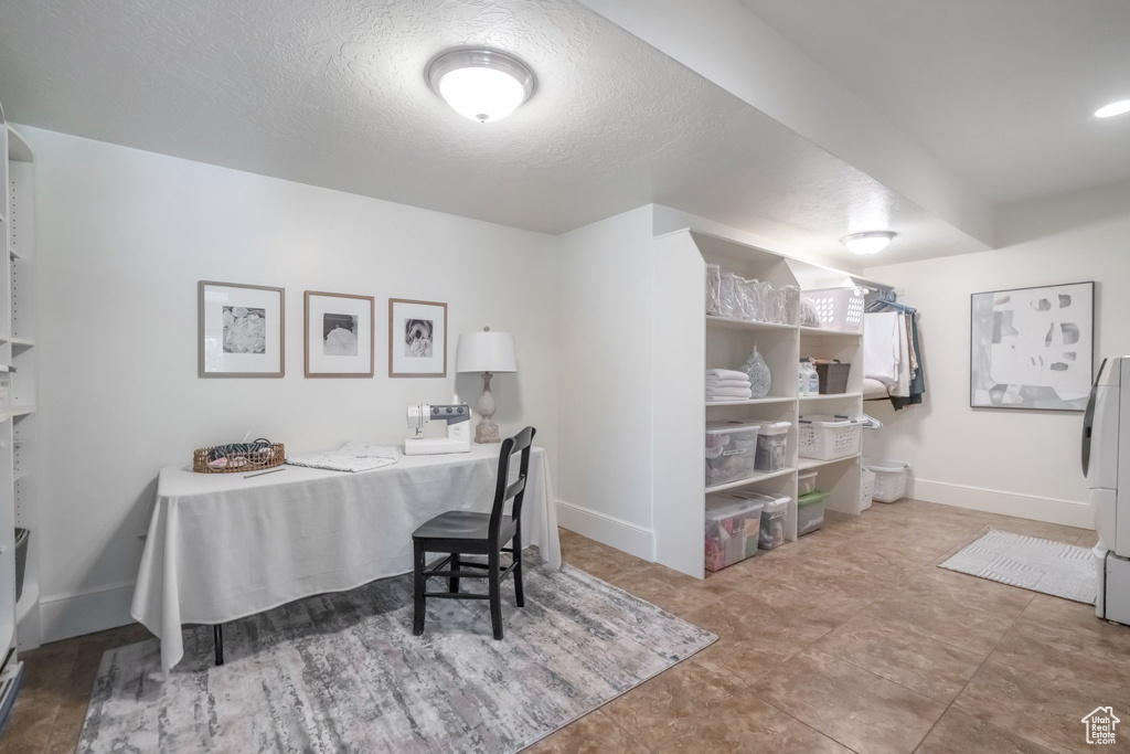 Office featuring a textured ceiling