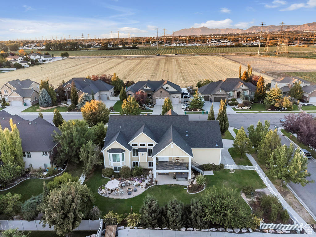 Birds eye view of property with a mountain view