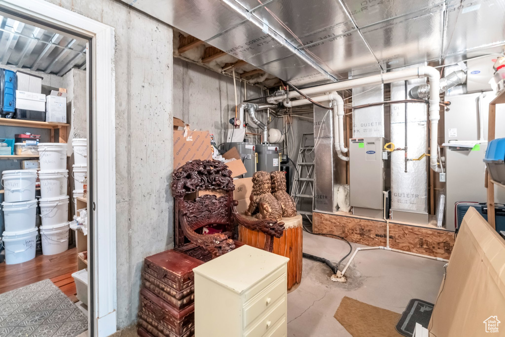 Basement featuring water heater