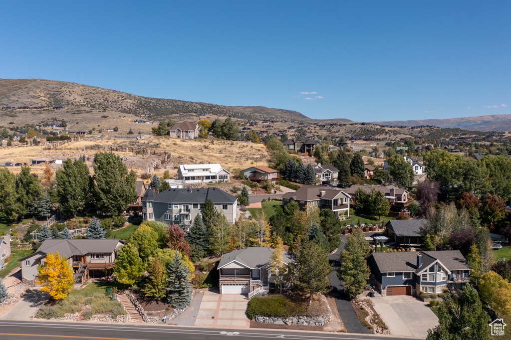 Birds eye view of property featuring a mountain view