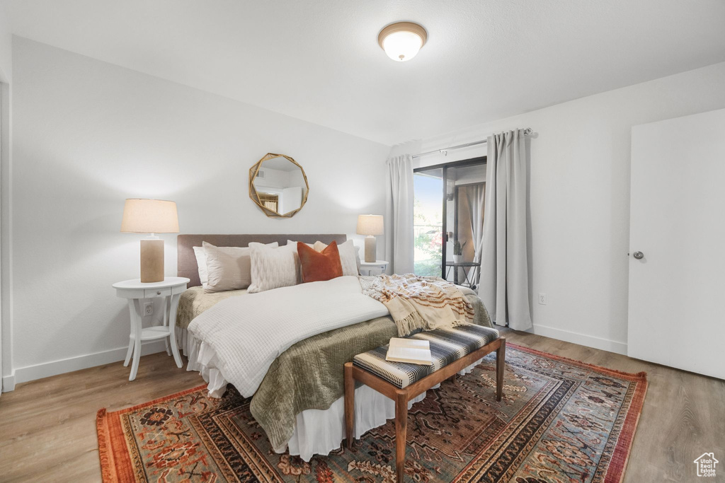 Bedroom with light wood-type flooring