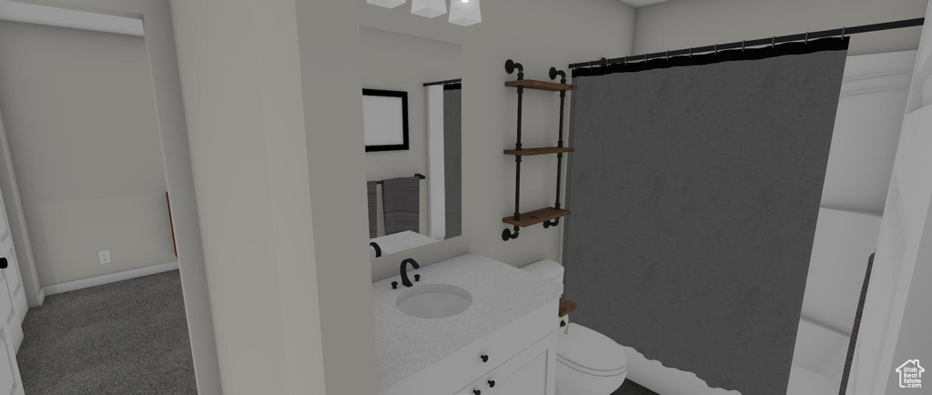 Bathroom featuring vanity, toilet, and curtained shower