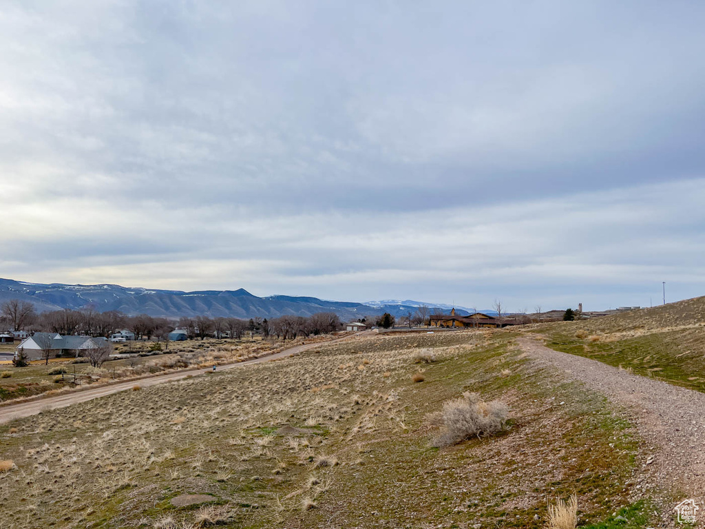 View of mountain feature with a rural view