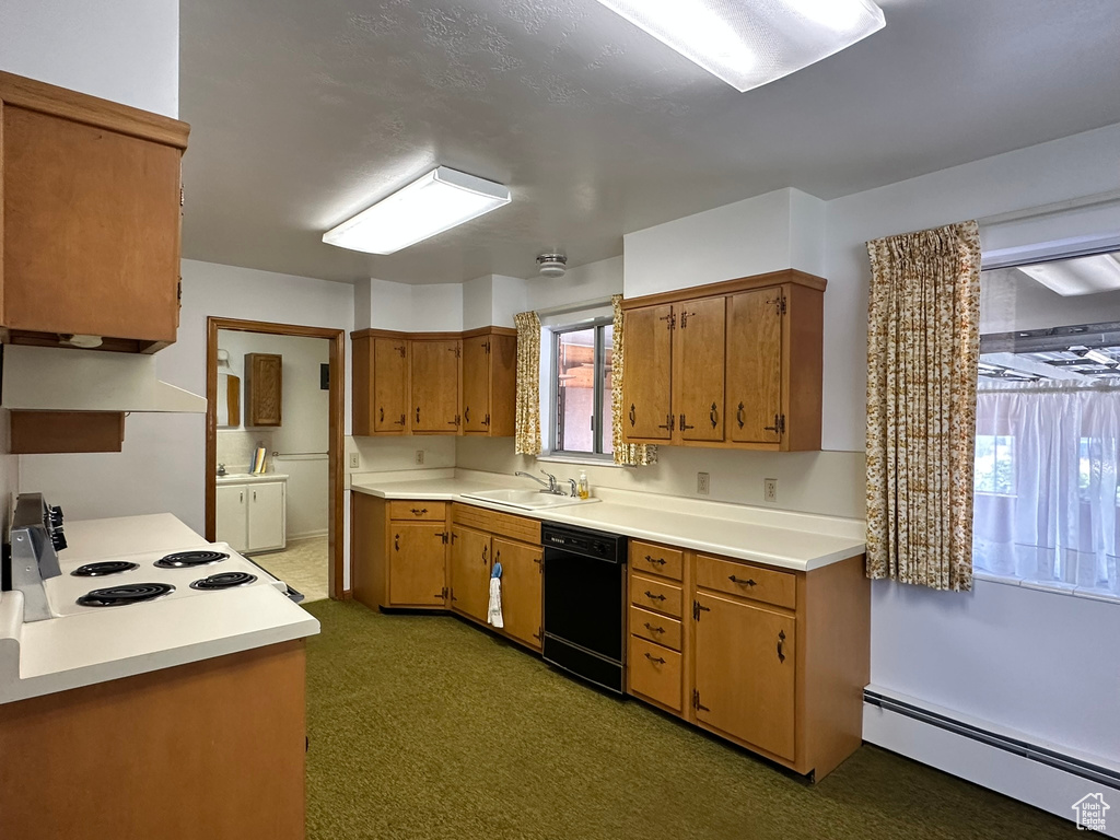 Kitchen with dishwasher, a baseboard heating unit, white electric range oven, and plenty of natural light